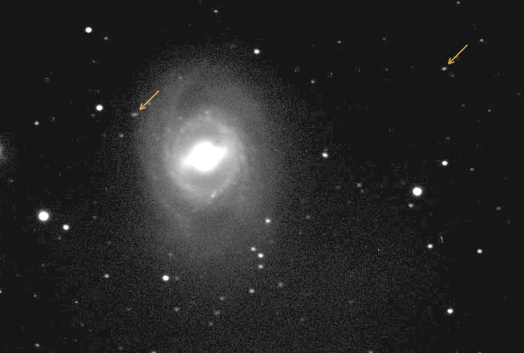 Animated: two asteroids moving near M95