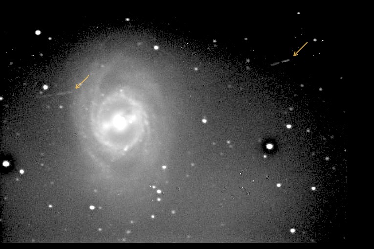 Two asteroids near M95