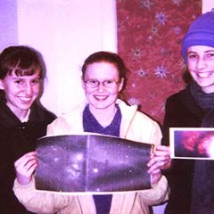 Students holding the pictures they took at the observatory